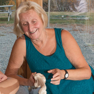 Donna Bajelis holds a joint model.